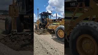 Puttin’ that soil cement on grade💪 #sitework #caterpillar #soil #construction #bluecollar #reddirt