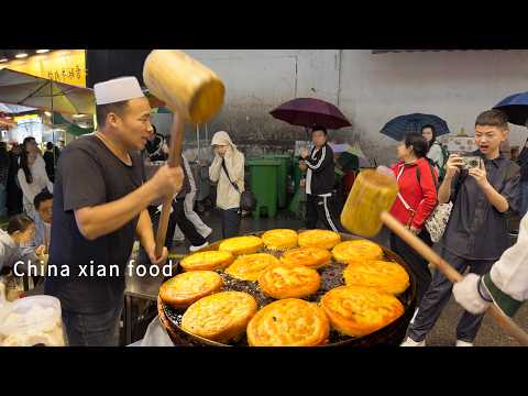 $1 roujiamo stars at Xi'an’s old market. Chewy noodles, sweet cakes—every bite’s bliss.