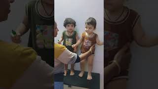 Twinbabies are doing multitask eating, writing,dancing.#cutetwins #twince #cute #twins #baby