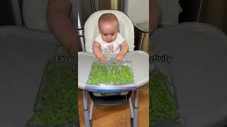 The easiest sensory activity for your babe! Literally just frozen peas and water in a ziploc  You co