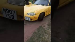 Mazda MX5 beached! Front splitter split in 1/2