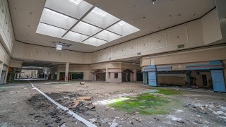 Exploring an Abandoned 1970s Era Mall built ontop of a Cemetary..