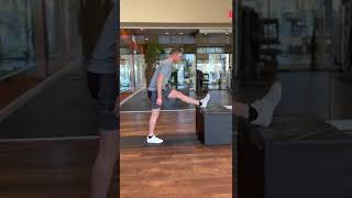 Standing hamstring stretch with leg elevated - Fit Family Physical Therapy
