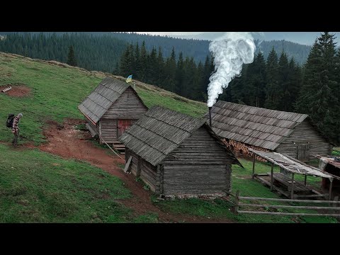 Almost abandoned log cabin in the mountains, This is where the shepherds live, far from civilization