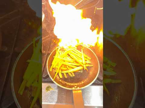 Flambé with baby carrots #flambe #food #fire #chef #cooking #food #foodie #foodshorts #chefpraveen