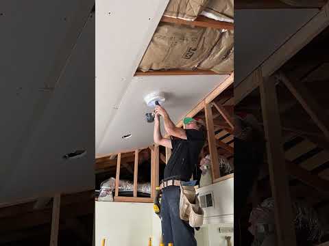 Cutting holes for recessed lights #construction #drywall #satisfying #demo #framing #electrical