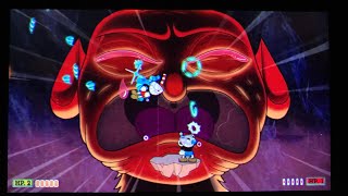 Cuphead beating the Devil with cursed relic