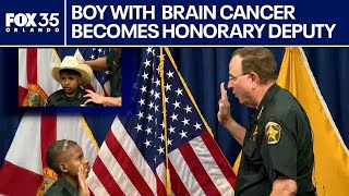 Florida sheriff swears in boy with brain cancer as honorary deputy