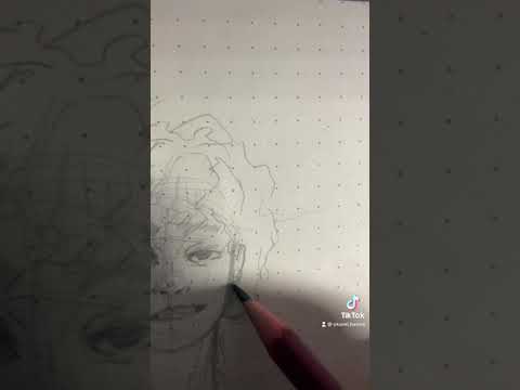 Dibujo en libreta de punto