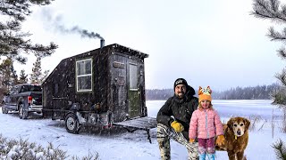 Riding out a SNOWSTORM in our Tiny Cabin by a Frozen Lake!