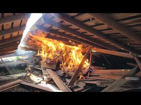Burning the old corn crib.