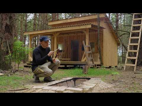 Remote off grid cabin, Wall insulation and cladding with clapboard