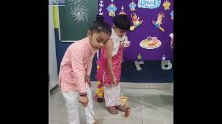 "Light, laughter, and learning on Diwali at school! 🌟 Making memories with friends and teachers! 📚"