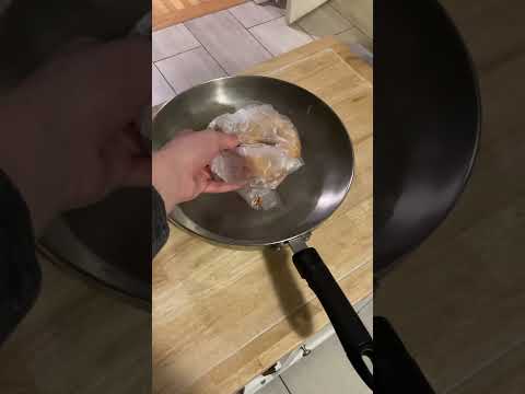 Putting a doughnut in a pan