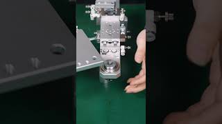 Immersive experience of assembling an automatic labeling head.