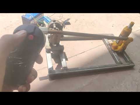 Wireless Automatic Hydraulic Jack for Four wheeler.