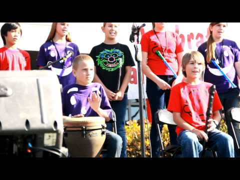 4th grader tearing up the djembe skins