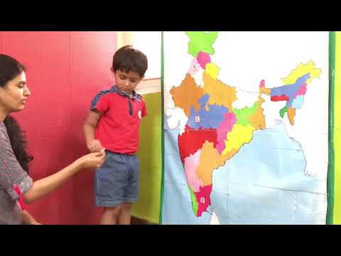 Jr.Kg child learning about leaders of India.
