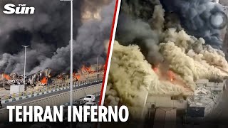 Heavy black smoke smothers Iran’s capital as HUGE FIRE destroys Tehran market