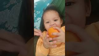 Tiny Taste Tester: Baby's Verdict on Orange Peel? YUM! 🍊😍#cute #baby #shorts #shortvideo