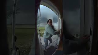 She saves her cat from strom #cat #catlovers #catshorts #cats #usa #uk #viral #shorts #trending